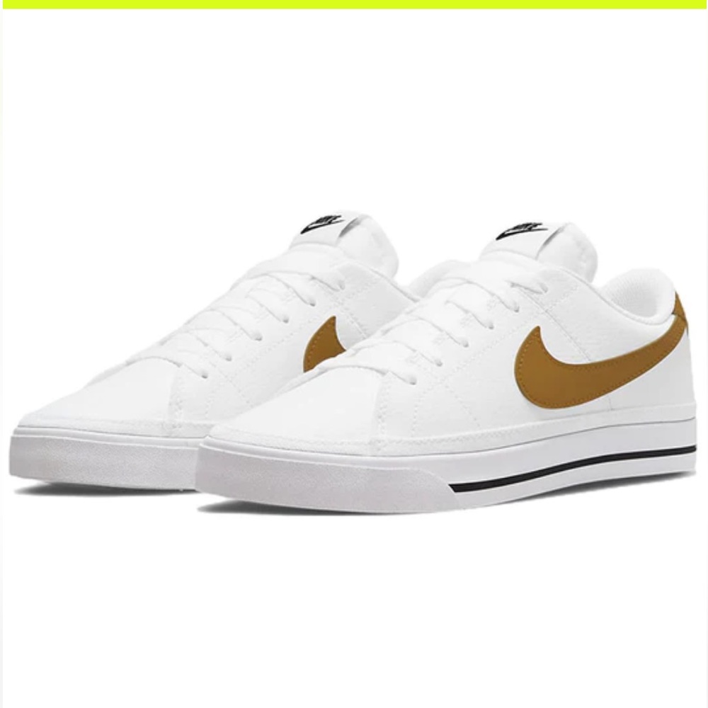 Nike Women’s White Sneakers with Brown Swoosh